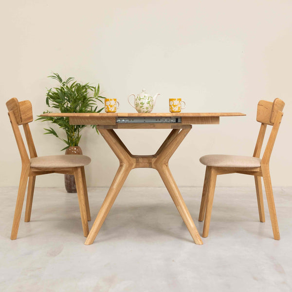 Table à manger ronde extensible en bois massif de chêne Carmen - NordicStory