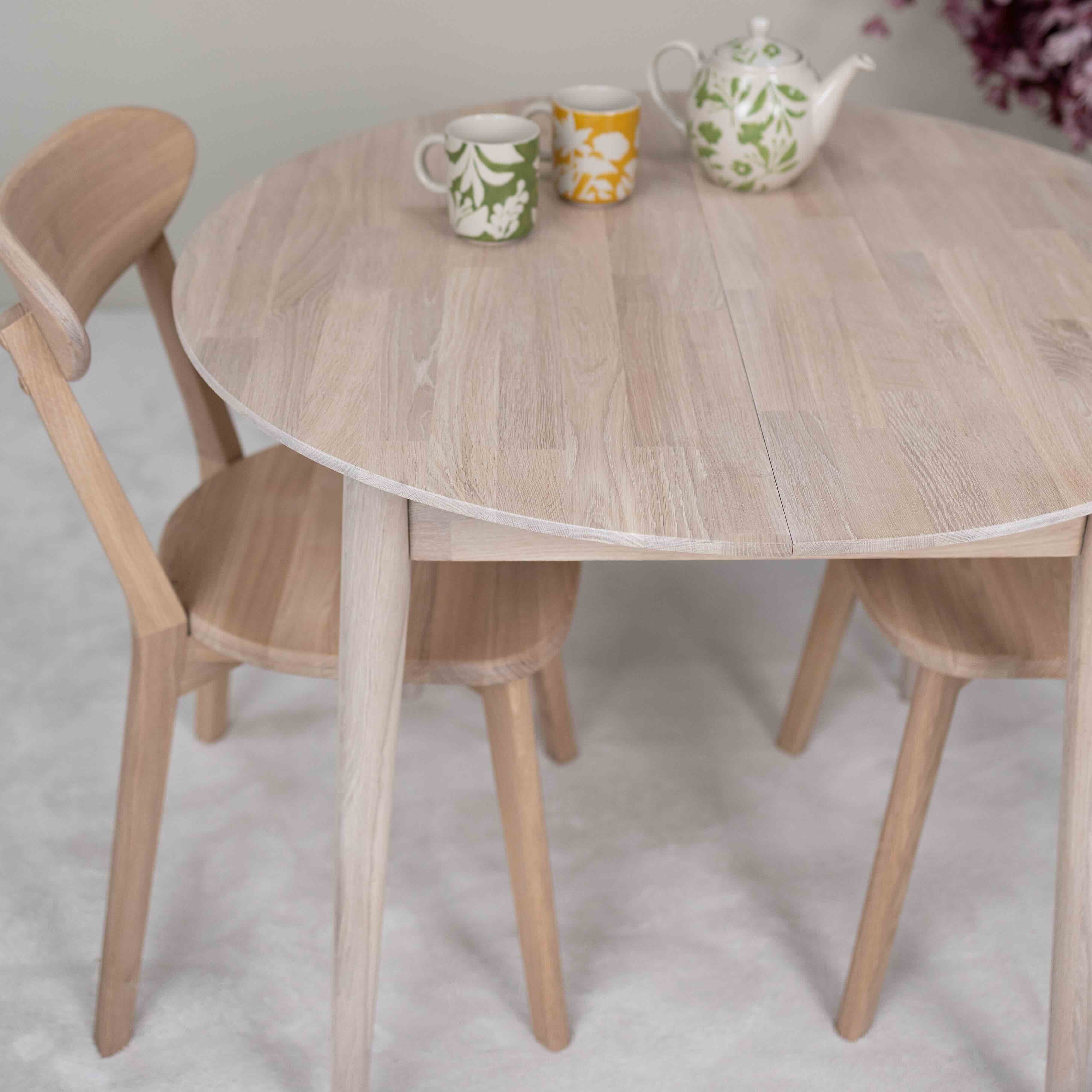 Table à manger extensible ronde en bois massif de chêne