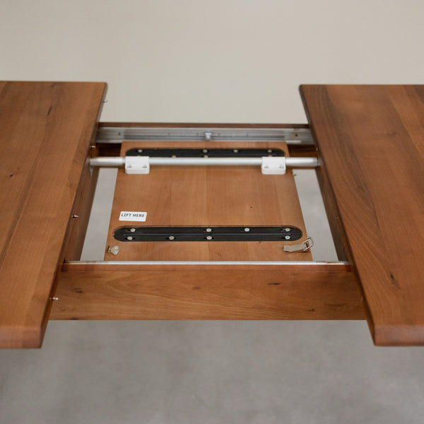 Table à manger extensible en noyer massif